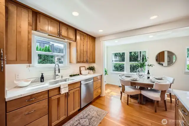 Take a look at the stunning quartz countertops, under cabinet lighting, and brand new sinks, faucets and stainless dishwasher!
