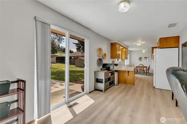 This room has slider that steps out onto a nice sized patio ~