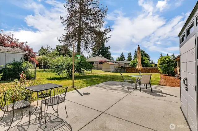 Nice big patio area for summer dining! Storage shed stays. Yard is fully fenced~