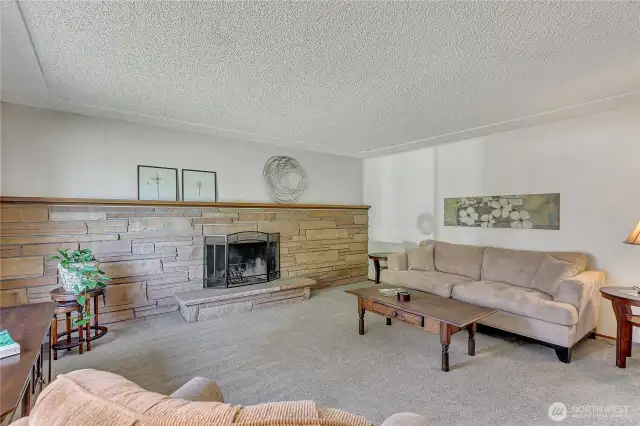 Big living room with great stone wood burning fireplace for cozy nights ~