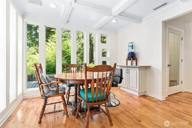 Thoughful built-ins and lots of windows make this space attractive, comfortable and functional.