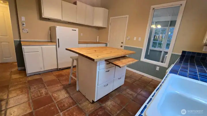 Plenty of cabinets and storage available in the kitchen!