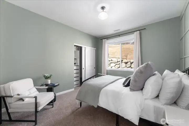 Bedroom 2 with closet system.