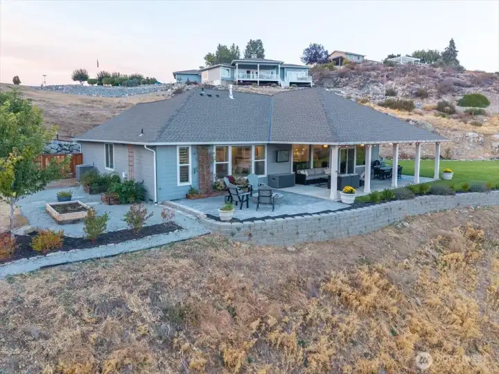 Exterior view of home and outdoor living area.