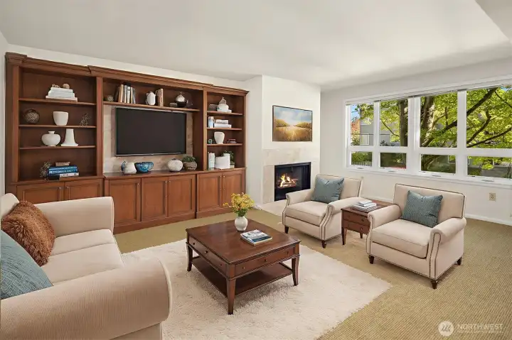 Virtually staged - this is one idea for the large living room with wood-burning fireplace.