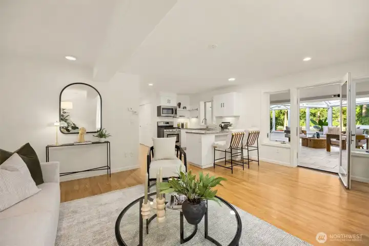 The lower has a full kitchen and adjoins an incredible sun room!