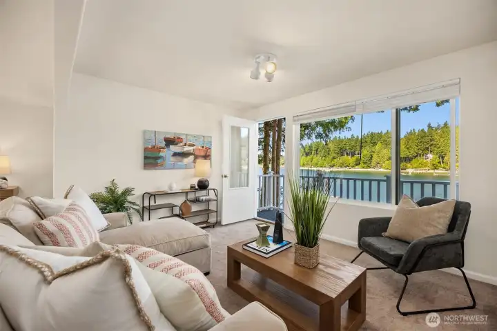 Upper level has a bedroom, living room and half bath.