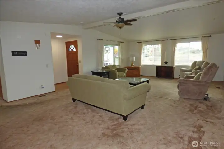 Another view of the large living room. Notice the stereo system on the wall.