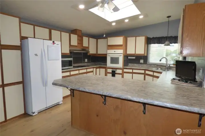 Another view of the kitchen. All appliances stay.