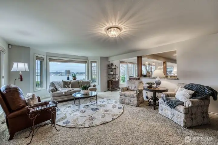 Look at all of those windows, the whole west side of the home has large picture windows to take in the wonderful views.