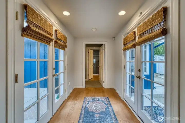 The breezeway takes you the primary suite with the private courtyards on the right and left.