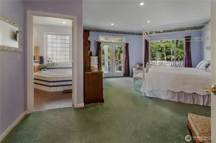 Primary suite sits off its own wing of the home with the office