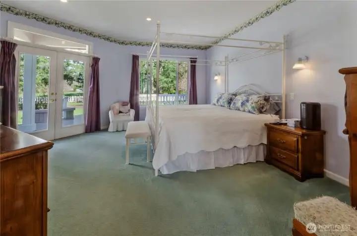 French doors lead right out to your wrap-around porch and hot tub