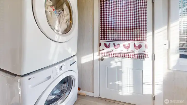 Laundry/mudroom at the back of the home
