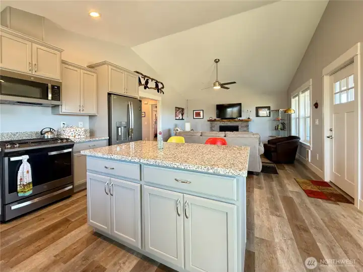 Stone slab counters throughout.