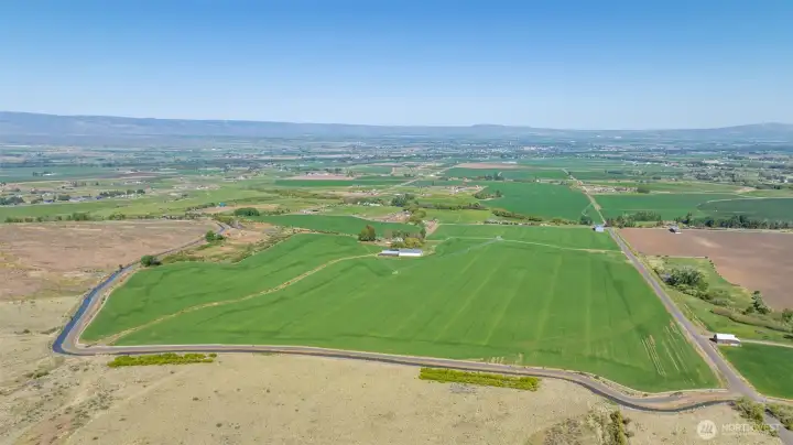 This expansive 158-acre farm features a home set in the middle of the property, offering unmatched privacy and stunning views. With flat, open land surrounding the home, the possibilities are endless—perfect for farming, ranching, or future development....