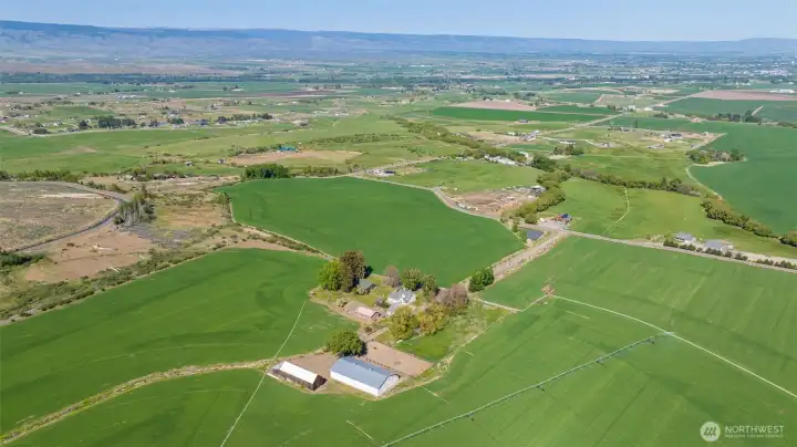 Flat, open farmland with a clear view toward town. Perfect for agriculture, livestock, or future development. A rare opportunity to own a large, versatile property! 158 acres