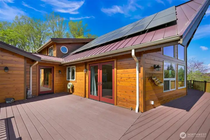 Composite deck has propane stub for barbeque.