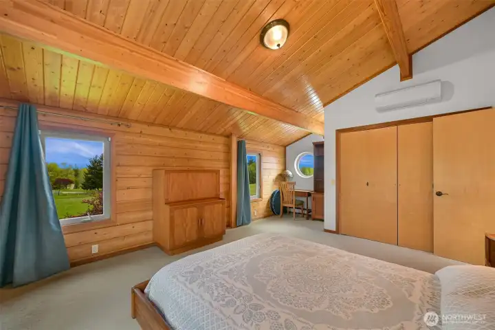Bedroom 2. Both upstairs bedrooms have vaulted ceilings.