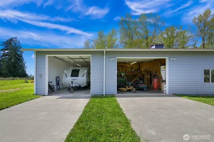 RV / trailer bay with 11' door, septic dump, water, and charging.