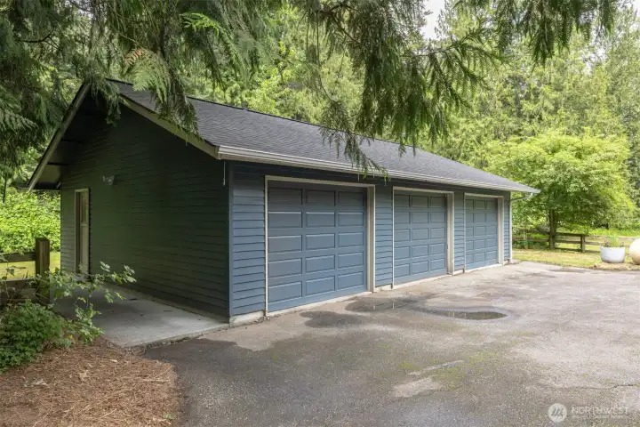 Spacious detached shop/garage offers incredible flexibility with multiple bays for vehicles, storage, hobbies, or workplace needs.