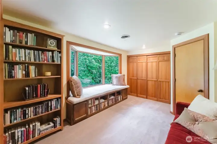 One of four bedrooms currently serving as a library.