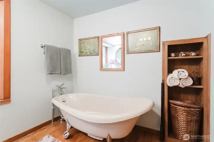 Second floor bathroom with a clawfoot tub.
