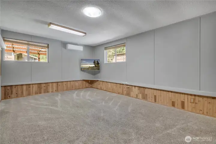 Large family room is the perfect place to hang out and entertain