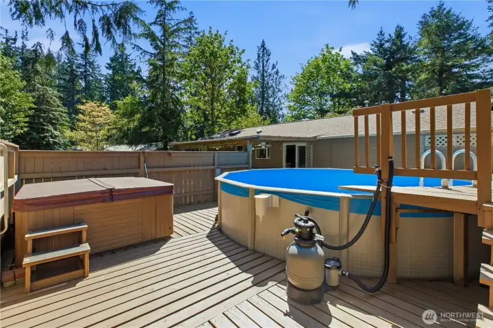 The fully fenced pool and hot tub are ready for summer fun!