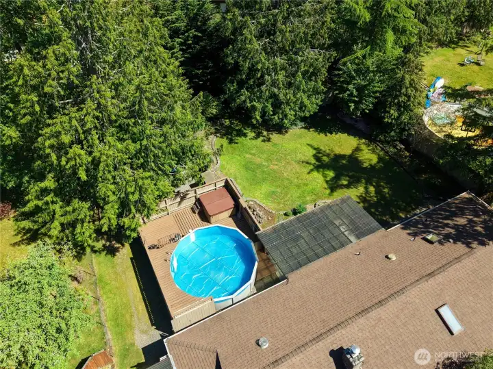Beautifully maintained property with mature trees for privacy
