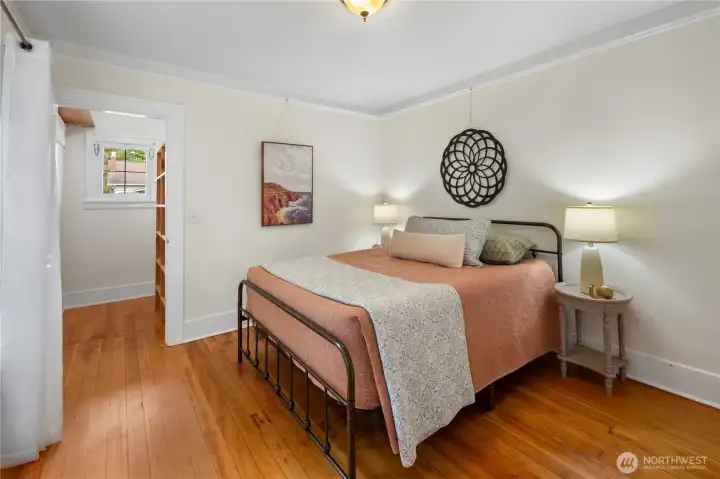 Main level bedroom with walk in closet. Main level bedroom with walk in closet.