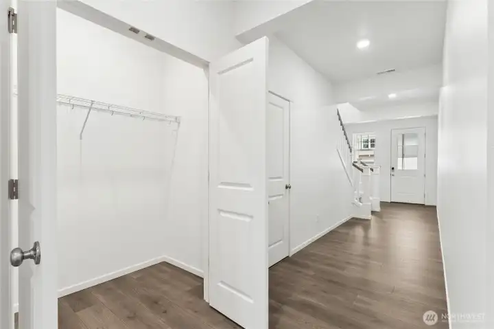 Double door coat closet off entryway. DISCLAIMER: Photos are for informational purposes only and are of another Sapphire floor plan in the community; actual colors, flooring, or carpet may vary Double door coat closet off entryway. DISCLAIMER: Photos are for informational purposes only and are of another Sapphire floor plan in the community; actual colors, flooring, or carpet may vary