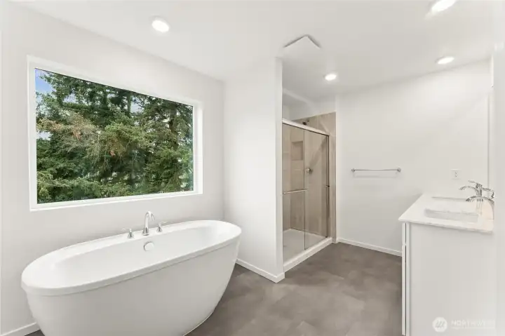 Primary Bath w/soaking tub and tilled shower DISCLAIMER: Photos are for informational purposes only and are of another Sapphire floor plan in the community; actual colors, flooring, features or carpet may vary Primary Bath w/soaking tub and tilled shower DISCLAIMER: Photos are for informational purposes only and are of another Sapphire floor plan in the community; actual colors, flooring, features or carpet may vary
