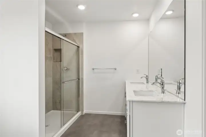 Primary Bath Tiled shower and double DISCLAIMER: Photos are for informational purposes only and are of another Sapphire floor plan in the community; actual colors, flooring, features or carpet may vary vaniey Primary Bath Tiled shower and double DISCLAIMER: Photos are for informational purposes only and are of another Sapphire floor plan in the community; actual colors, flooring, features or carpet may vary vaniey