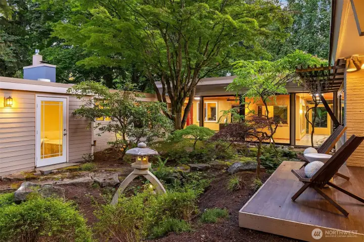 Enchanting courtyard with stone pathways and small gullies designed to collect water and hence create natural ponds during heavy rainfalls.