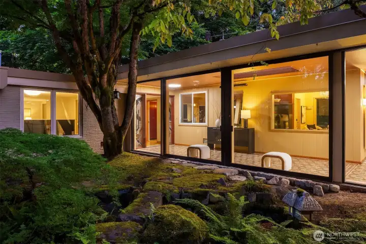Large sliding doors opening to the courtyard
