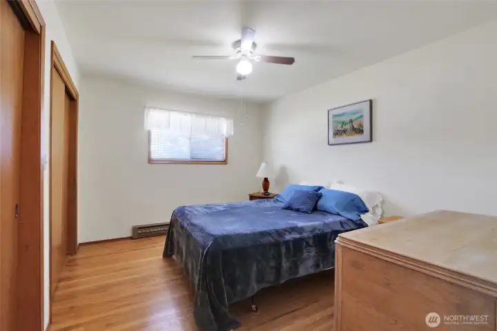 Primary bedroom with double closets and hardwood floors! Primary bedroom with double closets and hardwood floors!