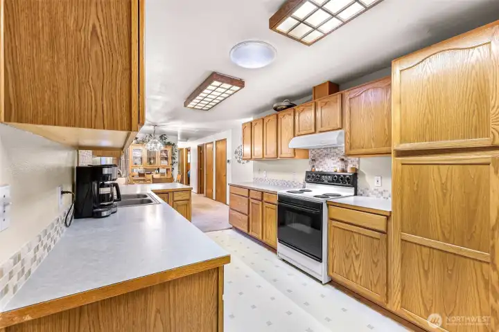 Expanded galley kitchen with lots of kitchen storage Expanded galley kitchen with lots of kitchen storage