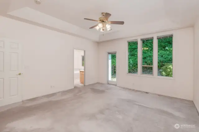 Primary Bedroom with access to a Private Side Yard