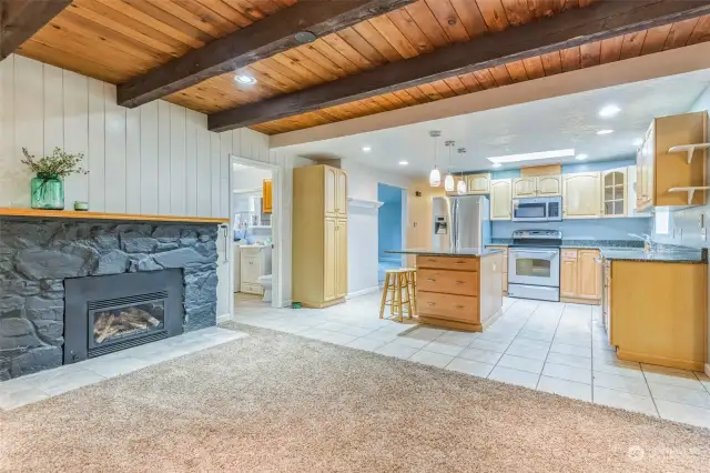 Family room looking into kitchen and laundry/half bath