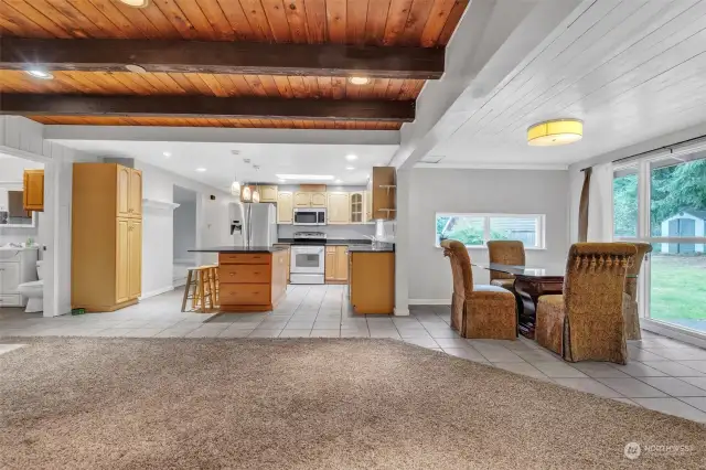 Family room looking toward kitchen and formal dining