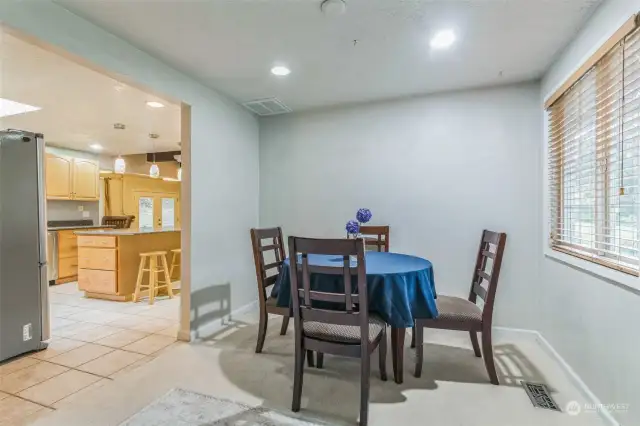 Informal dining room looking into kitchen