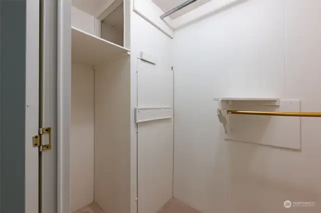 Walk in closet in primary bedroom