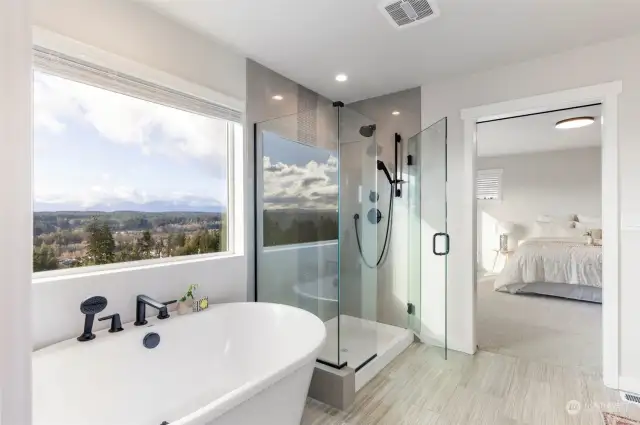 Soaking tub and glass surround shower