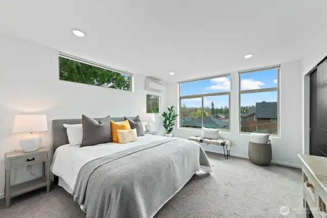 Large primary suite with ductless heating and AC.