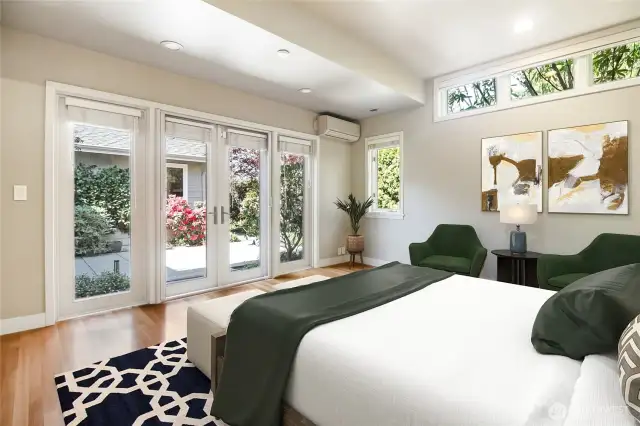 French doors open to a private courtyard, creating a tranquil retreat.