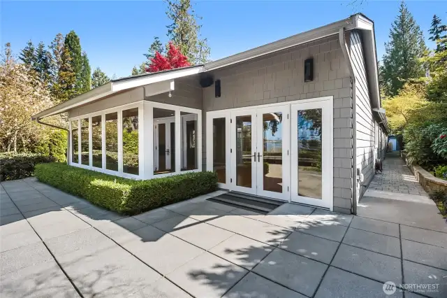 Bask in the beauty of west-facing Lake Washington views as natural light floods the space, creating a serene and tranquil atmosphere that enhances this exceptional setting.