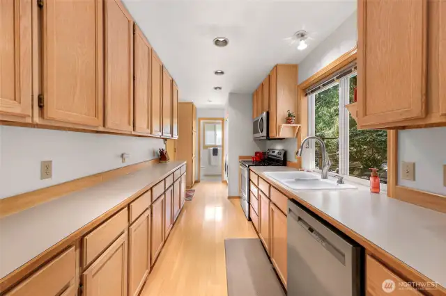 Tons of cabinet & countertop space in this bright kitchen