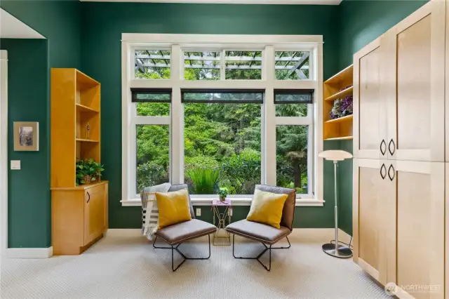 The primary bedroom has a studio attached. Room for quilting, projects or seclusion off the main bedroom.