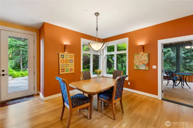 The dining area is just off the kitchen and the door leading to the screened porch. Great for entertaining.